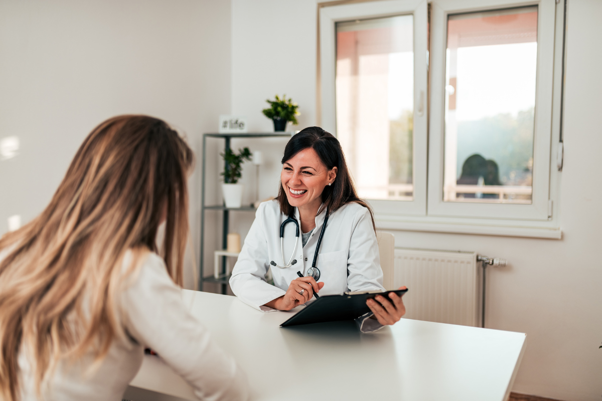 A functional medicine doctors with her patient